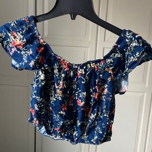 blue floral off the shoulder shirt